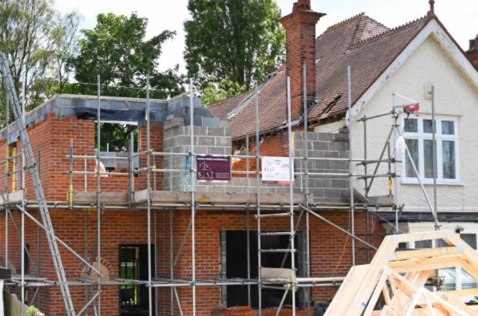 Two-storey brick extension under construction